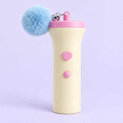 Pixel Pop cat wand launcher in Bubblegum: cream handle, pink cap, light-blue pom-pom